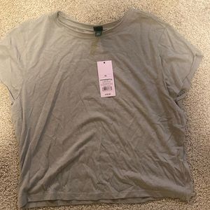 Baby tee shirt NEVER WORN. STILL WIGH TAGS.